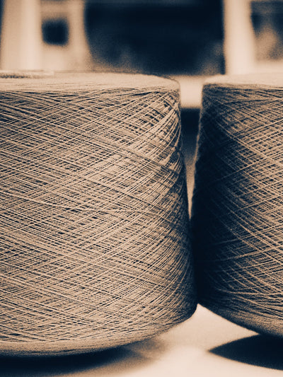 Wide Open World's Tasmanian Superfine Merino yarn on cones