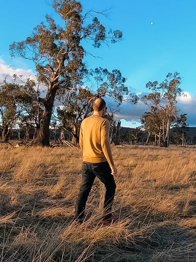 Wide Open World's Founder, Olivier Maréchal, walking on farm in the Tasmanian Midlands